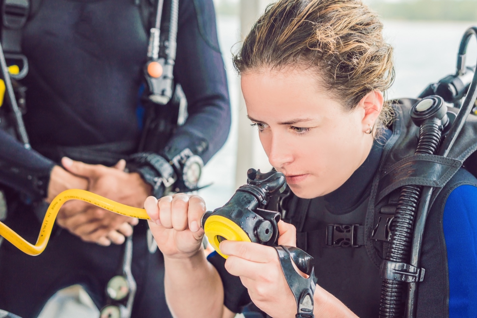 Divers gearing up on a South Florida boat in winter